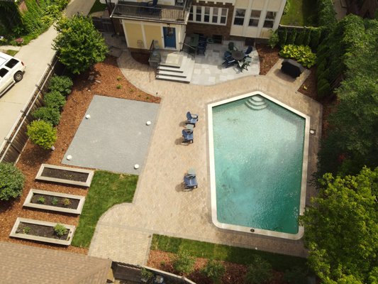 Pool deck and surrounding - This home had a dated look to their pool deck and their plants were all overgrown and dying. We came in and pulled up all of the existing paver bricks and reused them in a new design. We also added a blue stone patio, new plantings, sod, and prepped footings for a large pergola. Pool deck and surrounding - This home had a dated look to their pool deck and their plants were all overgrown and dying. We came in and pulled up all of the existing paver bricks and reused them in a new design. We also added a blue stone patio, new plantings, sod, and prepped footings for a large pergola.