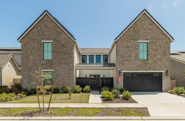 NEW LISTING-Clovis-built in 2021 - This spacious, stunning home was custom built in 2021 and in pristine condition. The home features a fully independent, private mother-in-law suite (complete with lock-off and separate entrance) equipped with its own kitchenette, washer-dryer closet, bedroom, and bathroom. The downstairs living, entertainment, and kitchen space flows continuously for a grand ambiance. The beautiful kitchen is equipped with professional-grade Monogram appliances. You'll enjoy the gas stove, built-in fridge and microwave, and massive entertaining island that seats six comfortably. The home also features a serene and private front-courtyard with dual french doors for outdoor hosting, plus a backyard that extends into a covered patio area. The hardwood floors, carpet, tile and paint are still like brand new. Solar panels are fully owned. The tandem garage fits up to 4 vehicles. Home automation is integrated - see who's at the door and change the thermostat from anywhere with your phone. The latest wi-fi technology delivers fast speeds throughout all 4,379 square feet of the home. You can simply take the keys and move in. This breathtaking home will not last long, so call your agent to schedule an appointment today NEW LISTING-Clovis-built in 2021 - This spacious, stunning home was custom built in 2021 and in pristine condition. The home features a fully independent, private mother-in-law suite (complete with lock-off and separate entrance) equipped with its own kitchenette, washer-dryer closet, bedroom, and bathroom. The downstairs living, entertainment, and kitchen space flows continuously for a grand ambiance. The beautiful kitchen is equipped with professional-grade Monogram appliances. You'll enjoy the gas stove, built-in fridge and microwave, and massive entertaining island that seats six comfortably. The home also features a serene and private front-courtyard with dual french doors for outdoor hosting, plus a backyard that extends into a covered patio area. The hardwood floors, carpet, tile and paint are still like brand new. Solar panels are fully owned. The tandem garage fits up to 4 vehicles. Home automation is integrated - see who's at the door and change the thermostat from anywhere with your phone. The latest wi-fi technology delivers fast speeds throughout all 4,379 square feet of the home. You can simply take the keys and move in. This breathtaking home will not last long, so call your agent to schedule an appointment today