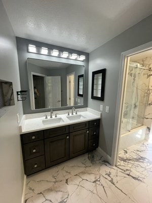 2025 Bathroom remodel - This bathroom wasn’t in bad shape, but the homeowner was ready for something new in a little more luxurious with a fancier tile and a more custom finish as well as a smart light. We tore out the old tub vanity, mirrors, and some drywall to be able to accommodate for the clients wishes. This whole project took us about two weeks from starting Demo to finishing paint 2025 Bathroom remodel - This bathroom wasn’t in bad shape, but the homeowner was ready for something new in a little more luxurious with a fancier tile and a more custom finish as well as a smart light. We tore out the old tub vanity, mirrors, and some drywall to be able to accommodate for the clients wishes. This whole project took us about two weeks from starting Demo to finishing paint