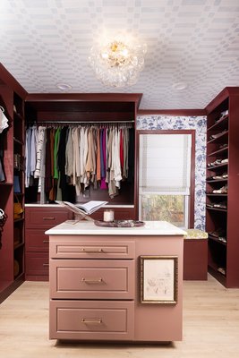 Primary Closet Design & Renovation - This primary closet was previously an under-used guest bedroom adjacent to the primary suite that felt like a waste of space, so we designed a fully custom closet of our client`s dreams! We also created an arched opening to the laundry room for easy access to laundry needs. In the adjacent laundry room we designed fully custom built-in storage including a fully integrated laundry hamper. Our client was thrilled with the final result and expressed that they start each day feeling happier in their new space! Primary Closet Design & Renovation - This primary closet was previously an under-used guest bedroom adjacent to the primary suite that felt like a waste of space, so we designed a fully custom closet of our client`s dreams! We also created an arched opening to the laundry room for easy access to laundry needs. In the adjacent laundry room we designed fully custom built-in storage including a fully integrated laundry hamper. Our client was thrilled with the final result and expressed that they start each day feeling happier in their new space!