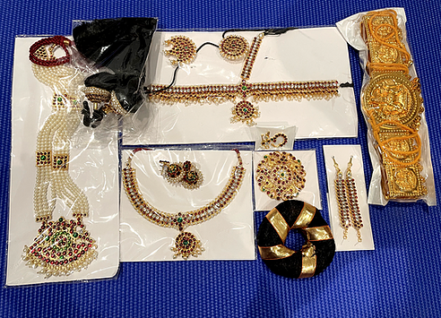 Accessories Available! Please Visit Website to Order! - Bharathanatyam Jewels Set, Pearl HaramChokerHead set, Suryan, ChandranStud and Jimki, Maatal attachment for jimki, Nathu Bullaku for nose, Rakodi hair ornament, Kunjalam hair ornament, Bun hair ornament, Hip Belt / Odyanam, and Flowers.