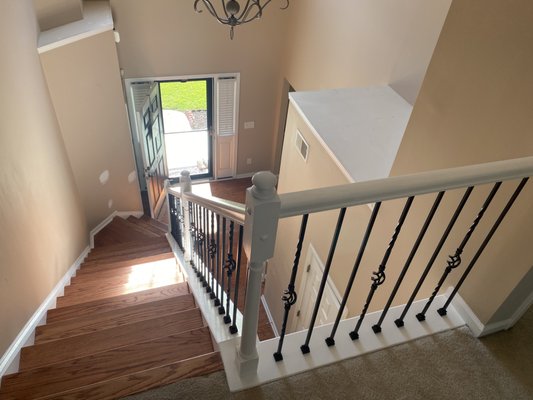Staircase handrail and baluster remodel - Summerville - We recently completed a staircase handrail and baluster restoration project in Summerville, South Carolina, helping the homeowner give their staircase a fresh, updated look without the cost of a full replacement.

For this project, our team removed the old stair balusters and replaced them with new metal balusters, creating a cleaner and more modern design. We also repainted the cap, newel posts, and handrails to refresh the entire staircase and bring everything together with a polished finish.

The final result was a simple but high-impact transformation that made the staircase look newer, cleaner, and more custom while keeping the project cost-effective.

This Summerville, SC project is a great example of our interior stair railing restoration, metal baluster installation, handrail painting, newel post refinishing, finish carpentry, and affordable staircase remodeling services in the Charleston area.