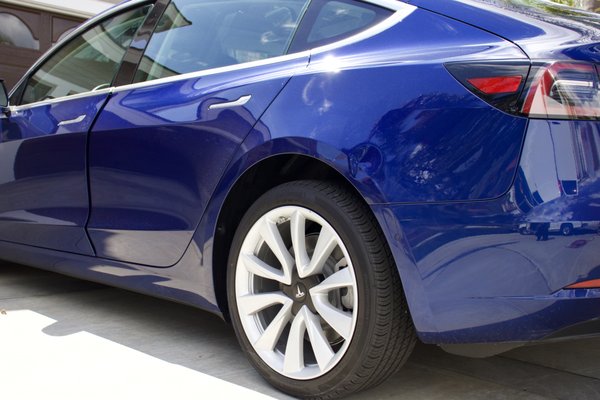 Tesla Model 3 | Dent and Scratch Repair - For this repair, we removed the dent and paint damage on a 2020 Tesla Model 3. We repainted the areas using our computerized paint matching system for a perfect finish, returning this vehicle back to new condition.