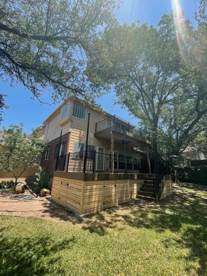 Rain Escape Deck - Our customer wanted a two-level deck with dry storage space underneath. We created a deck system with a rain escape for both levels. Customer ended up with a beautiful outdoor living space and dry storage area underneath the lower deck. Rain Escape Deck - Our customer wanted a two-level deck with dry storage space underneath. We created a deck system with a rain escape for both levels. Customer ended up with a beautiful outdoor living space and dry storage area underneath the lower deck.