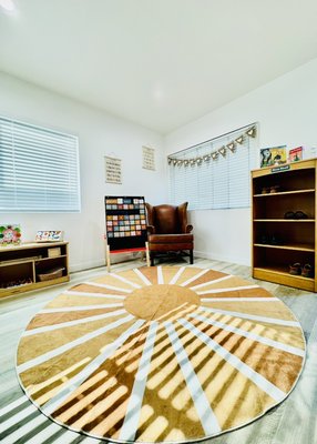 Mini Explorer’s Academy main room. - Introducing Mini Explorer’s Academy main room. This album features some of our shelves that consist of the following material; writing area, language arts, math, dramatic play, Montessori wooden doll house, connections, and etc.