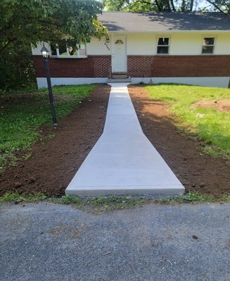Concrete walkway - customer had no walk way, was muddy and messing walking in grass, happy we could help, putting smiles on our customers is our passion