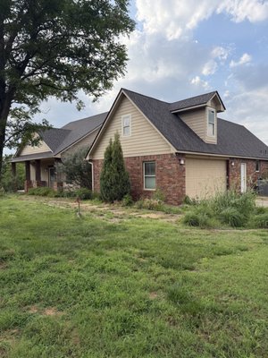 GAF Midnight Mesa Roof - This is a completed project of a customer's farmhouse we replaced the roof on. Installed a new GAF shingle color "Midnight Mesa" and he is thrilled with the turnout.