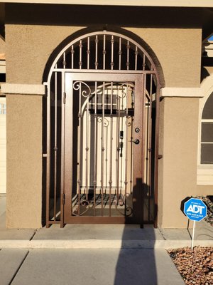 Custom Entry Iron Door - The customer wanted to add some home protection to their door entry as well as add an outside sitting area for pets when the weather allows.