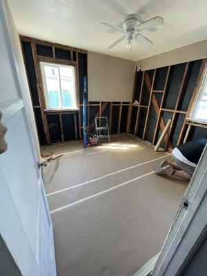 10'x10' Room Repair - The customer had a plumbing leak in their house, causing damage to a 10x10 room. We stepped in, fixed up the rotten parts of the walls by reframing them, insulated the outside walls, put up drywall, and made sure it matched the existing texture. Termites had wreaked havoc on the window sill and jambs, so we rebuilt them to match the other windows in the house. We also swapped out the baseboards, caulked everything, and painted the room in the color the customer wanted. 10'x10' Room Repair - The customer had a plumbing leak in their house, causing damage to a 10x10 room. We stepped in, fixed up the rotten parts of the walls by reframing them, insulated the outside walls, put up drywall, and made sure it matched the existing texture. Termites had wreaked havoc on the window sill and jambs, so we rebuilt them to match the other windows in the house. We also swapped out the baseboards, caulked everything, and painted the room in the color the customer wanted.