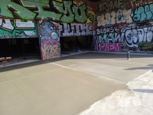 Commercial concrete pour - This was an empty commercial lot that needed to be brought back to working condition. Replacing the concrete so it looks better and drains adequately makes a huge difference.