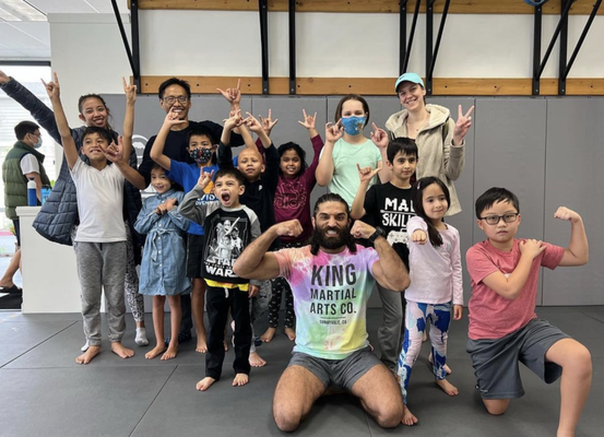 Kids MMA - Kids love MMA too! Our kids classes are taught by professionals in a safe and supportive environment. We teach the fundamentals of kickboxing, boxing, and grappling through proper technique while giving your child a great workout and teaching them a skill.
Parents of our kids clients have shared that MMA training has helped their children build confidence as well as physical strength and agility, which has helped them excel in other sports such as soccer. We recommend MMA over other martial arts programs for your kids, as MMA covers a comprehensive martial arts knowledge that will condition their bodies and minds. Kids MMA - Kids love MMA too! Our kids classes are taught by professionals in a safe and supportive environment. We teach the fundamentals of kickboxing, boxing, and grappling through proper technique while giving your child a great workout and teaching them a skill.
Parents of our kids clients have shared that MMA training has helped their children build confidence as well as physical strength and agility, which has helped them excel in other sports such as soccer. We recommend MMA over other martial arts programs for your kids, as MMA covers a comprehensive martial arts knowledge that will condition their bodies and minds.