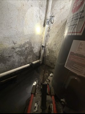Kitchen Sink drain repair - How to do a repair for a kitchen sink drain line going into a stack and had to snake the line as well. Finish the repair with PVC  inch and an half and a half. drain line is open.
