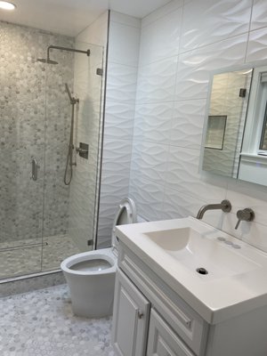 bathroom remodeling - this bathroom remodeling which designed and executed by our skilled people , we added few features like : wall-mounted vanity faucet , 3D textured porcelain tiles , LED-TECH mirror bathroom remodeling - this bathroom remodeling which designed and executed by our skilled people , we added few features like : wall-mounted vanity faucet , 3D textured porcelain tiles , LED-TECH mirror