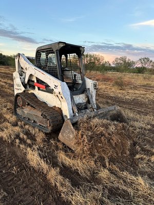Horse Arena - Built a horse arena from scratch.  Removed the grass.  Got the grade level and ready for sand.