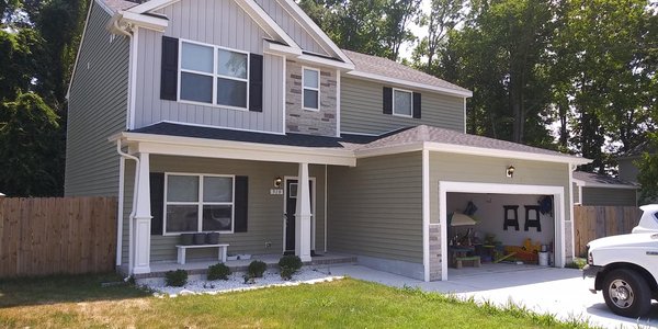 New high gloss seamless gutters - Brand new seamless gutters.  Owner was tired of water pooling right in front of the front door and the walkways always being wet.