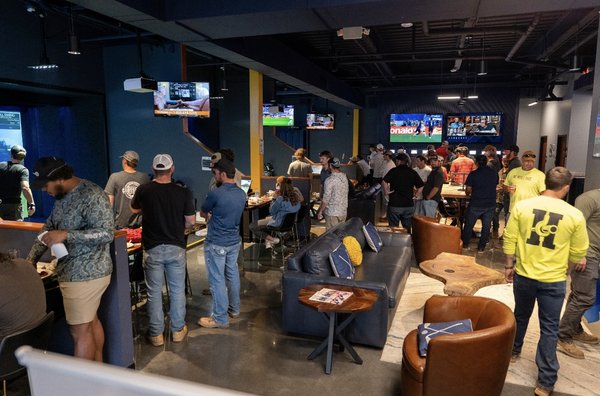 The Birdie & Brews Experience - Birdie & Brews was built to create a one-of-a-kind social sports experience combining Full Swing golf and multi-sport simulators, a self-serve tap wall, and a comfortable lounge atmosphere. The space was designed for everything from date nights and watch parties to tournaments, corporate events, and group outings—all centered around great drinks, competitive fun, and a unique experience