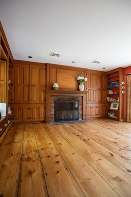 Natural Pine Wood Floor Refinishing - This pine hardwood floor was professionally sanded and refinished to restore its natural warmth and character. The natural finish highlights the unique grain, knots, and beautiful variations of the pine while preserving the rustic charm of the original floor. The result is a warm, refreshed look that fits perfectly with the character of the home. Natural Pine Wood Floor Refinishing - This pine hardwood floor was professionally sanded and refinished to restore its natural warmth and character. The natural finish highlights the unique grain, knots, and beautiful variations of the pine while preserving the rustic charm of the original floor. The result is a warm, refreshed look that fits perfectly with the character of the home.