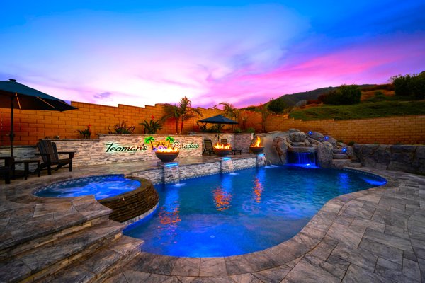 Teomans Paradise - This backyard transformation was nothing short of a battle against the elements — and worth every challenge.



From the very start, this project tested us with relentless rain, saturated soil, and multiple cave-ins during excavation.But through the setbacks came determination. And the end result speaks for itself 
— a luxury resort-style escape right in the backyard. Stacked stone finishes, custom water features, integrated fire bowls, lush landscaping, and a show-stopping rock waterfall all came together to create what is now “Teoman’s Paradise.”

This one reminded us that the most beautiful builds are often the ones you fight hardest for.
Built by California Pools – Corona
#TheWatersCalling 🌴🔥💦