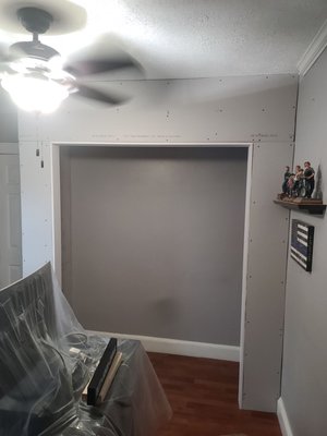 New Closet - Jan 2024 - Client craved a closet for their clothes in a closet-less house. Work in progress—mudding, painting, and setting rods to come. Client thrilled with the closet's transformation!