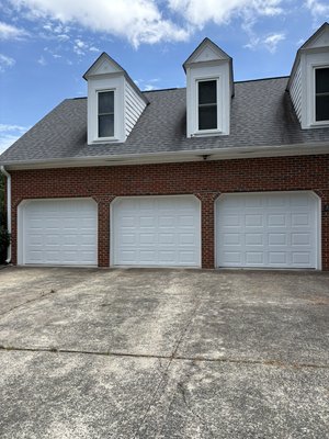 Upgrade in Durham - These doors were replaced and openers upgraded due to some door damage occurring from vehicle bump. Customer chose to upgrade to insulated doors and new belt openers.