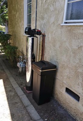 Water Softener Installation - This client had an existing water conditioner that wasn’t working. We switched out the system and replaced it with a bigger tank and used our premier series water softener to remove the scale and build up our client was experiencing. Our water softener also removed the chemicals and bacteria/heavy metals out of the tap water.