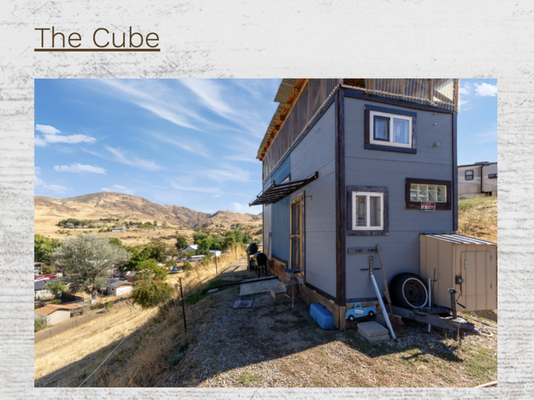 The Cube $60 - ($65 + $40 a night after)

We are an affordable, unique stay where travelers smile and give 5 star reviews.  We are a safe and secure property; a small where everybody knows your name town. The Cube has great views.  Try the hammock. You just might decide to sleep in it. New Tuft & Needle queen topper. NOTE!, starting in November, this will be a dry rental, no shower, no sink water.  You can rent at a reduced price of $40 and still use the toilet. (you have to fill the tank with a gallon jug of water)  Free spring water!

There are no domestic free range animals on this  2 acre property.  There are wild turkeys, quail, and deer.  My wife and I enjoy the different views thru each window.  The bean bag chairs work perfectly in the lounging loft. You can set a drink on either windowsill while watching a DVD movie on the big screen.  Note that the TV viewing tilts in all directions so you can watch it from the hammock, too. We changed the roof on the third level to a repurposed used metal. We allow one dog for $20.  No cats.  We give you 5 local discount cards to eat and save money by supporting Horseshoe Bend businesses. If you’re hunting or ATVing,  we have room for trailers.

2 Guests, $20 cleaning fee, pets allowed for an additional $20