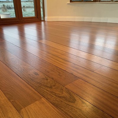 Brazilian cherry sand and refinish - Beverly hills - sanded and finish this Brazilian cherry hardwood flooring in Beverly hills, also known as Jatoba, is a popular choice for homeowners looking for a durable flooring option. However, like any natural wood flooring, it can become worn and damaged over time. In such case, proper sanding and refinishing is the solution to bring it back to life.

One of the great things about Brazilian cherry hardwood is that it is incredibly hard and durable. This makes it a great option for high-traffic areas of the home, as it can withstand the wear and tear of daily use without showing too many signs of damage. In addition, Brazilian cherry hardwood is known for its natural beauty, with a rich, reddish-brown color that can add warmth and character to any room.

Another benefit of Brazilian cherry hardwood flooring is that it is very versatile. It can be used in both traditional and contemporary design styles, and can be stained to match a wide range of different color schemes. This can make it a great choice for homeowners looking to update their living space without committing to a specific design aesthetic.

When it comes to maintaining a Brazilian cherry hardwood floor, regular sweeping and mopping can help to keep it looking its best. For deeper cleaning, a mild detergent can be used, but it's important to be careful not to use harsh chemicals or excessive water, as this can cause damage to the wood. It's also recommended to periodically reseal or apply a coat of finish to protect the wood and keep it looking like new.

Finally, it's worth mentioning that Brazilian cherry hardwood flooring is a relatively eco-friendly option. It is derived from a renewable resource, and it is also considered to be a sustainable flooring choice because it is harvested from managed forests, where new trees are planted to replace those that are harvested.

In conclusion, Brazilian cherry hardwood flooring is a great choice for those who want a durable and beautiful flooring option that can withstand high-traffic and last for many years. With proper care and maintenance, a Brazilian cherry hardwood floor can be brought back to life, which makes a great addition to any home.