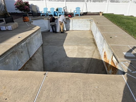 ClearCoat Liner Upgrade - This project involved a complete in ground pool liner replacement, starting with draining and stripping the pool down to its shell. The existing liner was carefully removed, and the pool surface was prepped by installing a new layer of foam insulation for added protection and durability. Following the foam installation, a high quality liner was precisely fitted and secured, creating a smooth, fresh surface. The project was completed by reinstalling all fittings and filling the pool with clear, clean water resulting in a fully restored and inviting swimming environment. ClearCoat Liner Upgrade - This project involved a complete in ground pool liner replacement, starting with draining and stripping the pool down to its shell. The existing liner was carefully removed, and the pool surface was prepped by installing a new layer of foam insulation for added protection and durability. Following the foam installation, a high quality liner was precisely fitted and secured, creating a smooth, fresh surface. The project was completed by reinstalling all fittings and filling the pool with clear, clean water resulting in a fully restored and inviting swimming environment.