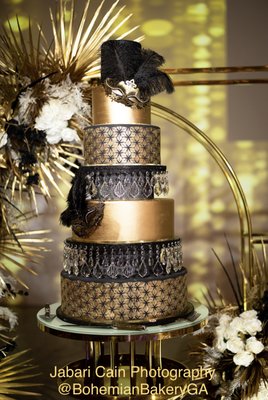 Luxury Wedding Cakes - We specialize in designing luxury cakes, and our wedding cakes often feature intricate fondant work and custom-made sugar flowers. These elements allow us to create truly unique and personalized designs for your special occasion. We would be delighted to discuss your vision and create a cake that reflects your individual style and preferences.
Please feel free to reach out if you would like to learn more about our luxury cake design services. Luxury Wedding Cakes - We specialize in designing luxury cakes, and our wedding cakes often feature intricate fondant work and custom-made sugar flowers. These elements allow us to create truly unique and personalized designs for your special occasion. We would be delighted to discuss your vision and create a cake that reflects your individual style and preferences.
Please feel free to reach out if you would like to learn more about our luxury cake design services.
