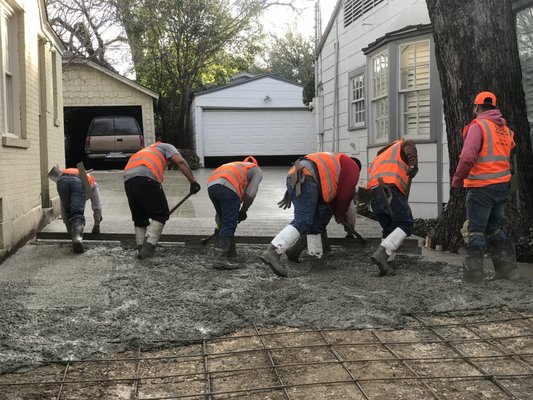 New Concrete Driveway - This new concrete driveway was poured off Stadium Drive near TCU. If you would like a quote for a new driveway feel free to reach out to us for any concrete work you need. New Concrete Driveway - This new concrete driveway was poured off Stadium Drive near TCU. If you would like a quote for a new driveway feel free to reach out to us for any concrete work you need.