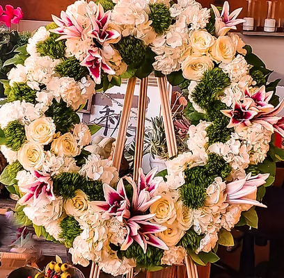 Unique Arrangements - A flower can speak any kind of greeting, even in the most solemn of events. Extend your condolences and offer of emotional support by sending flowers to the bereaved family. Your beautiful gift of flowers can bring comfort to the family and assure them that you really care.
We can send a tasteful arrangement from our inventory of fresh flowers. Just call the store and tell them what you'd like and your budget for the arrangement. We'll then make sure your arrangement arrives on time.
We can also create a sympathy spray. Below you will see examples of our work and prices for each. Please call the store if you would like us to design something unique and personalized for you and your loved one. That is what we did for the people who ordered the designs you see below. Unique Arrangements - A flower can speak any kind of greeting, even in the most solemn of events. Extend your condolences and offer of emotional support by sending flowers to the bereaved family. Your beautiful gift of flowers can bring comfort to the family and assure them that you really care.
We can send a tasteful arrangement from our inventory of fresh flowers. Just call the store and tell them what you'd like and your budget for the arrangement. We'll then make sure your arrangement arrives on time.
We can also create a sympathy spray. Below you will see examples of our work and prices for each. Please call the store if you would like us to design something unique and personalized for you and your loved one. That is what we did for the people who ordered the designs you see below.