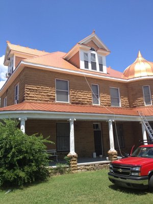 Metal Roof Installation In McAlester, OK - This is a standing seam metal and metal shingles installed on historic home in McAlester, OK. We were excited to take on this project because it was a unique job on a beautiful home. We moved quickly and our customers were very happy with the results.