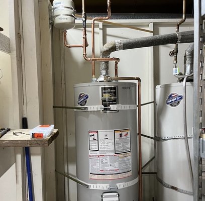 Water Heater Installation - At James & James we don't play games. Compare our water heater installation to the adjacent heater to see the difference. We don't skimp on quality parts and installation. Our pipes are even straight, after all the word 'plumb' is in our job title!