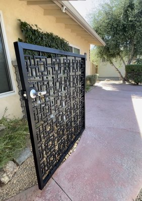 Custom gate design & fabrication. - Custom gate design done for a client to match the pattern of the neighboring block wall.