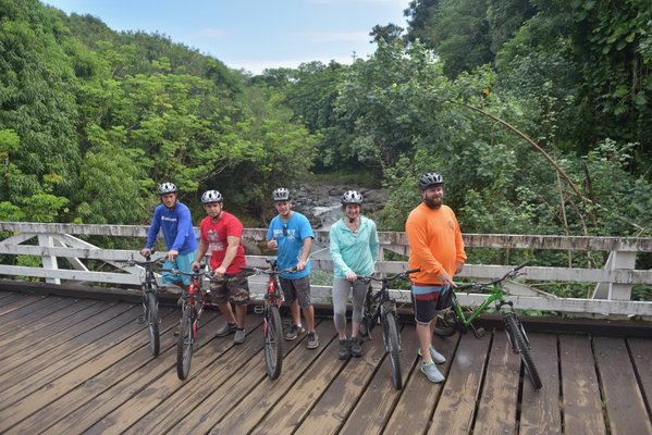 Bike Tours and Rentals - Discover Hakalau by Bike either on a Tour or Rental on your own!
Hop on a bike and discover the beauty of Hakalau as you ride through the amazing scenery that this unique area has to offer! Taking off from Botanical World Adventures, your incredible journey takes you through an area of the Hamakua Coast that was once dominated by Hawaii’s sugar industry.
The tour then makes its way through a segment of the Old Mamalahoa Highway. Surrounded by green rolling pastures and lush scenery, this once-well-traveled road takes us back in time as you make your way through old plantation villages. These historic backroads also take you over bridges from the early 1900s!
Pass communities built up and brought down with the industry and become mesmerized by the abundance of greenery… all while taking in the sights of pristine streams and waterfalls that cascade down from conservation land on the slopes of Mauna Kea! This is one ride you’re not likely to forget! Bike Tours and Rentals - Discover Hakalau by Bike either on a Tour or Rental on your own!
Hop on a bike and discover the beauty of Hakalau as you ride through the amazing scenery that this unique area has to offer! Taking off from Botanical World Adventures, your incredible journey takes you through an area of the Hamakua Coast that was once dominated by Hawaii’s sugar industry.
The tour then makes its way through a segment of the Old Mamalahoa Highway. Surrounded by green rolling pastures and lush scenery, this once-well-traveled road takes us back in time as you make your way through old plantation villages. These historic backroads also take you over bridges from the early 1900s!
Pass communities built up and brought down with the industry and become mesmerized by the abundance of greenery… all while taking in the sights of pristine streams and waterfalls that cascade down from conservation land on the slopes of Mauna Kea! This is one ride you’re not likely to forget!