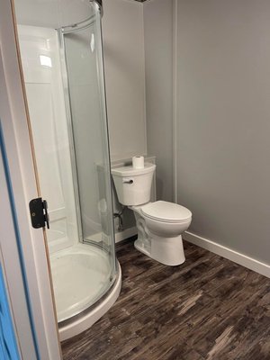 Bathroom Remodel Complete - This job was a full tear out of old drywall, cabinets, toilet, shower, floor and ceiling. Updated with modern pieces and colors picked by the homeowner. Call us today for your project! 810-444-6833