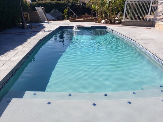 Fontana ca, project - this project was an old fiberglass pool in very bad shape that got demolished and replaced by inground gunite with custom aqua blue tile and