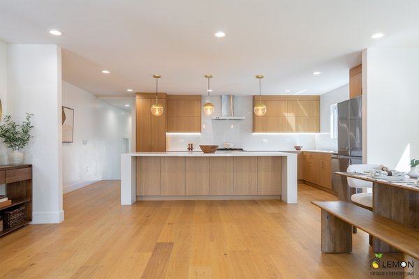 Modern Wood Kitchen Transformation - This stunning remodel features a large center island with a sleek waterfall stone design, perfect for entertaining and everyday use. Full-height custom cabinets all the way up to the ceiling maximize storage, while a dedicated pantry adds convenience and organization.
We installed tile backsplash all the way up the wall for a seamless, modern finish, combining durability with a high-end look. This kitchen balances beauty and functionality, bringing together warm wood tones, premium appliances, and hidden storage for a clean, timeless design.
At Lemon Remodeling, every detail was crafted with precision to deliver a kitchen that is both stylish and practical for everyday living.
Lemon Remodeling is proud to be a Diamond Certified Company Modern Wood Kitchen Transformation - This stunning remodel features a large center island with a sleek waterfall stone design, perfect for entertaining and everyday use. Full-height custom cabinets all the way up to the ceiling maximize storage, while a dedicated pantry adds convenience and organization.
We installed tile backsplash all the way up the wall for a seamless, modern finish, combining durability with a high-end look. This kitchen balances beauty and functionality, bringing together warm wood tones, premium appliances, and hidden storage for a clean, timeless design.
At Lemon Remodeling, every detail was crafted with precision to deliver a kitchen that is both stylish and practical for everyday living.
Lemon Remodeling is proud to be a Diamond Certified Company