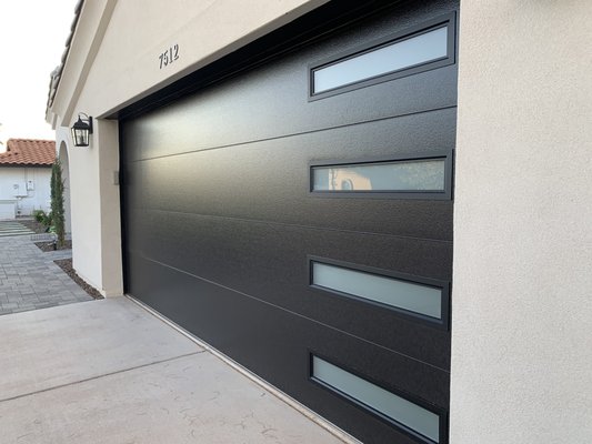NEW CLOPAY 4308 MODERN STEEL COLLECTION - Thank you A&M Assisted Living of Scottsdale to trust our company to install a beautiful modern steel garage door! NEW CLOPAY 4308 MODERN STEEL COLLECTION - Thank you A&M Assisted Living of Scottsdale to trust our company to install a beautiful modern steel garage door!