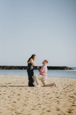 Proposal shoot Alex and Tony - Magic Island Proposal. Alex had no idea where tony was taking her. Her reaction was priceless and was captured on the dime.
