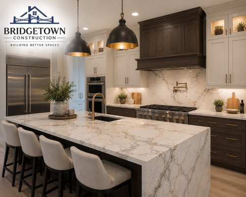 Luxury Full kitchen Remodel 2026 - Full Kitchen Remodel – Custom Two-Tone Design
This full kitchen remodel was designed to blend luxury and functionality, featuring custom two-tone shaker cabinetry with warm white uppers and rich dark wood base cabinets. We installed stunning full-slab quartz countertops with a waterfall island, matching full-height backsplash, premium hardware, custom hood surround, upgraded lighting, and modern fixtures—creating a timeless, high-end space built for everyday living and entertaining.