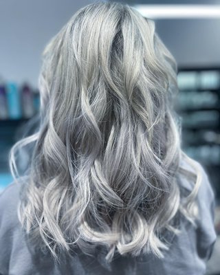 Silver Color and Extensions - My client wanted to freshen up her color by adding babylights. We added extensions to add length and volume Silver Color and Extensions - My client wanted to freshen up her color by adding babylights. We added extensions to add length and volume