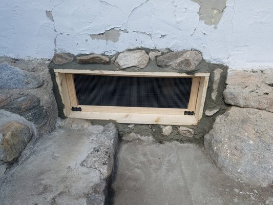 Custom Crawl Space Entry Doors - This unique home was built in 1921. The buyer purchased this home to remodel and turn into a rental. There were no existing crawl space entry doors which allowed rodents and other animals to enter and nest. This also allowed access into the home through small holes/cracks from under the home. Our team designed, measured, built, and installed these custom crawl space entry doors which are both secured to the structure of the home. In addition to that, we added mortar with rocks to help blend in with the surrounding areas to create a more seamless installation. We did not skip on functionality either! Both doors can be removed in a breeze and locked/secured in place to prevent animals from damaging and/or remove the doors.

We also keep in mind the outside elements that these doors are exposed to, going as far was nautical direction to know whether it will receive more/less sunlight, rain, etc. All wood was treated in-house with a wood preservative treatment which protects against dry rot, fungus, mold, and WDOs (wood destroying organisms).

Contact us today for a free quote! No project is too big or too small!