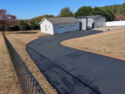 crack repair and sealcoat application for asphalt driveway - Asphalt Sealcoating & Crack Repair
This project included cleaning and preparing the existing asphalt surface, repairing cracks to prevent further damage, and applying a fresh sealcoat for long-lasting protection. The sealcoating restored a clean, uniform appearance while helping extend the life of the driveway and improve curb appeal. crack repair and sealcoat application for asphalt driveway - Asphalt Sealcoating & Crack Repair
This project included cleaning and preparing the existing asphalt surface, repairing cracks to prevent further damage, and applying a fresh sealcoat for long-lasting protection. The sealcoating restored a clean, uniform appearance while helping extend the life of the driveway and improve curb appeal.