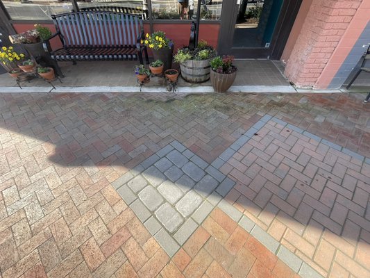 Art Works with Sherry Bingham: entryway cleanup - This storefront in downtown cherryville needed their newly paved entryway cleaned up as their busy season was beginning.

We took care to clean it up for them, all while keeping all plants alive and not affecting the neighboring business