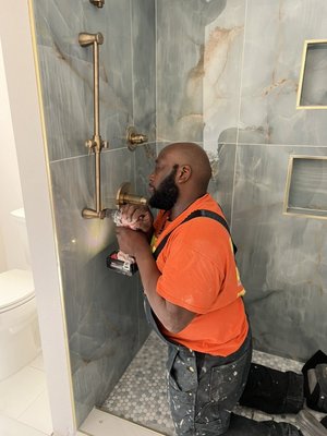 🚿 Bathroom Remodel - This remodel was done on a fairly updated bathroom, but they wanted to update it even more they wanted to change their regulars shower surround to tile. They also wanted to pull up the laminate flooring that they have for tile. Also wanted to change the bathroom color to what you see currently. Overall, the customer is very happy and satisfied with the cost and the timeframe that we got it down. 🚿 Bathroom Remodel - This remodel was done on a fairly updated bathroom, but they wanted to update it even more they wanted to change their regulars shower surround to tile. They also wanted to pull up the laminate flooring that they have for tile. Also wanted to change the bathroom color to what you see currently. Overall, the customer is very happy and satisfied with the cost and the timeframe that we got it down.
