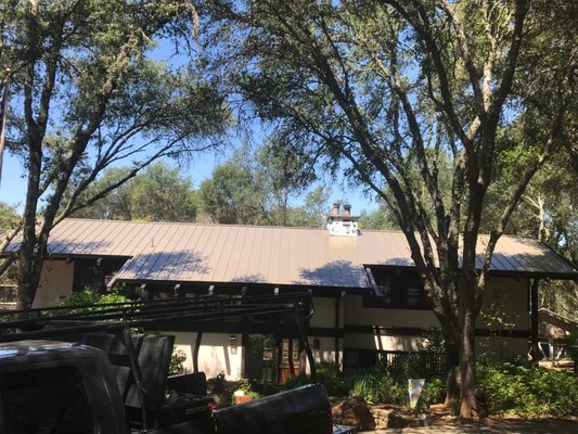 Standing Seam Metal Re-roof - Removed old tile roof 
Installed Standing Seam Metal Roof
Installed now 7" seamless gutters and downspouts