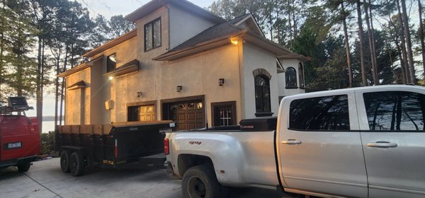 Complete re- roof of shingle home in Sherrills Ford on Lake Norman - The home owner was referred to us for roof replacement from a friend in the same development.
We did an on site inspection by drone and found considerable damage on the 24 year old roof.
We started the 75 square project on a Tuesday at dawn and completed it mid day on Thursday. The roof had 39 facets and being mostly 3 story it was slower work than a simple one or two story roof.
We assisted the customer in choosing a color that would look good with the brown trim rather than the grey they had before. Complete re- roof of shingle home in Sherrills Ford on Lake Norman - The home owner was referred to us for roof replacement from a friend in the same development.
We did an on site inspection by drone and found considerable damage on the 24 year old roof.
We started the 75 square project on a Tuesday at dawn and completed it mid day on Thursday. The roof had 39 facets and being mostly 3 story it was slower work than a simple one or two story roof.
We assisted the customer in choosing a color that would look good with the brown trim rather than the grey they had before.