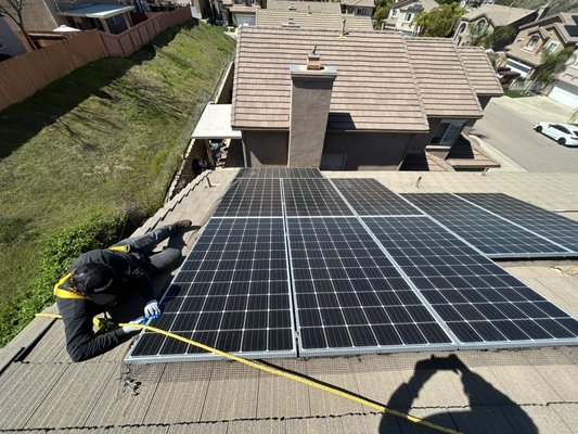 Solar Panel Bird Proofing - This install was done after our customer complained of constant noise in the rooms below the panels.  Once we inspected the roof we found a large nest starting and a lot of droppings. We were able to install the netting before any eggs were laid and the pigeons have safety been excluded.