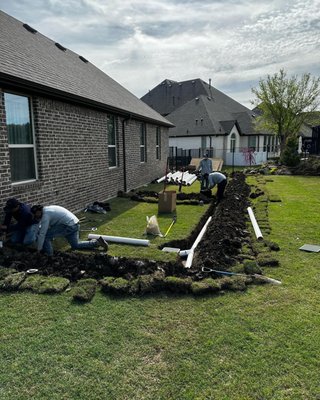 Residential Drainage - If you have an area with a large amount of water to drain we can handle it no problem! We hand dig to prevent damage to existing utilities and we take pride in our minimally invasive drains.

Cornerstone LMC is a team of contractors specializing in drainage installations, landscaping, and outdoor construction. In addition, our prices are competitive, and we guarantee all work we do for one year of parts and labor. At Cornerstone Landscape & Construction, you can depend on our professionalism and devotion to provide you with complete customer satisfaction. Whether you require the installation of French drains, sprinkler maintenance, or outdoor construction, you can rest assured that we provide the excellent service you are looking for. Our team promises you a superior customer experience and outstanding quality work, so for more information about our offered services, contact us at Cornerstone Landscape & Construction today!